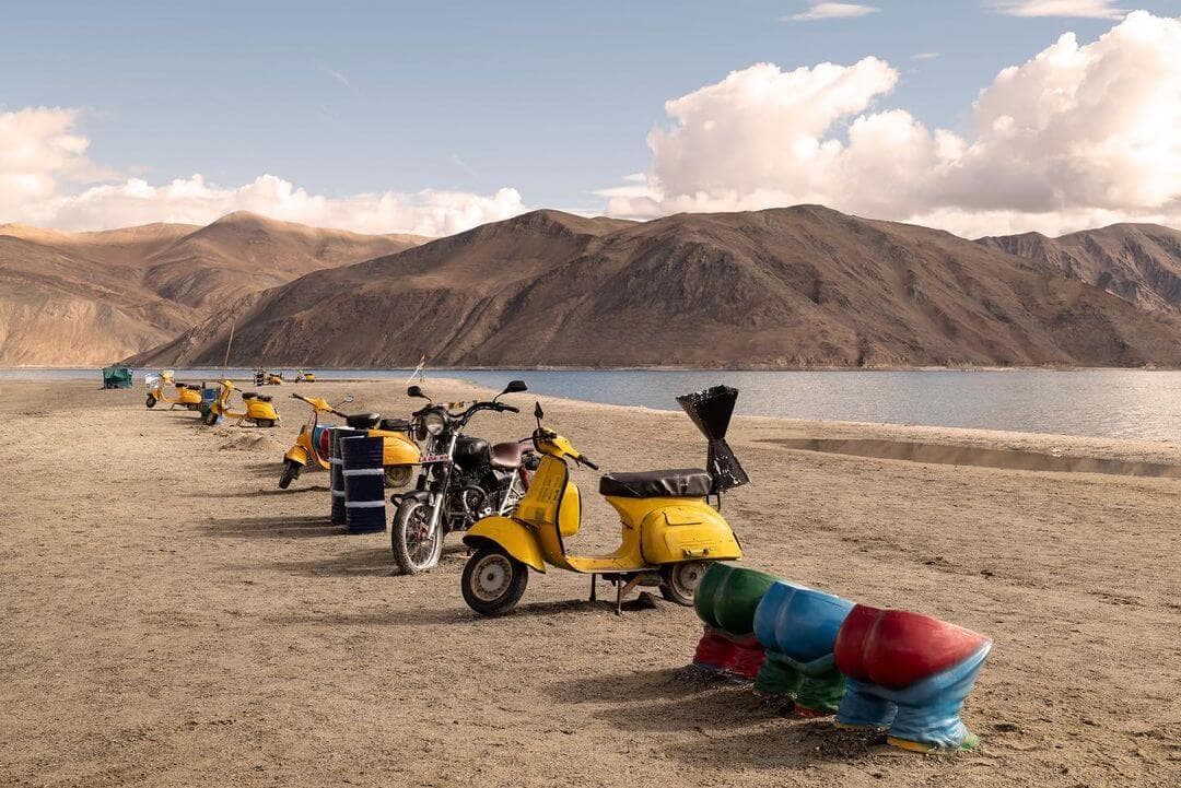 Pangong Lake Ladakh with crystal-clear blue waters and dramatic mountain landscapes