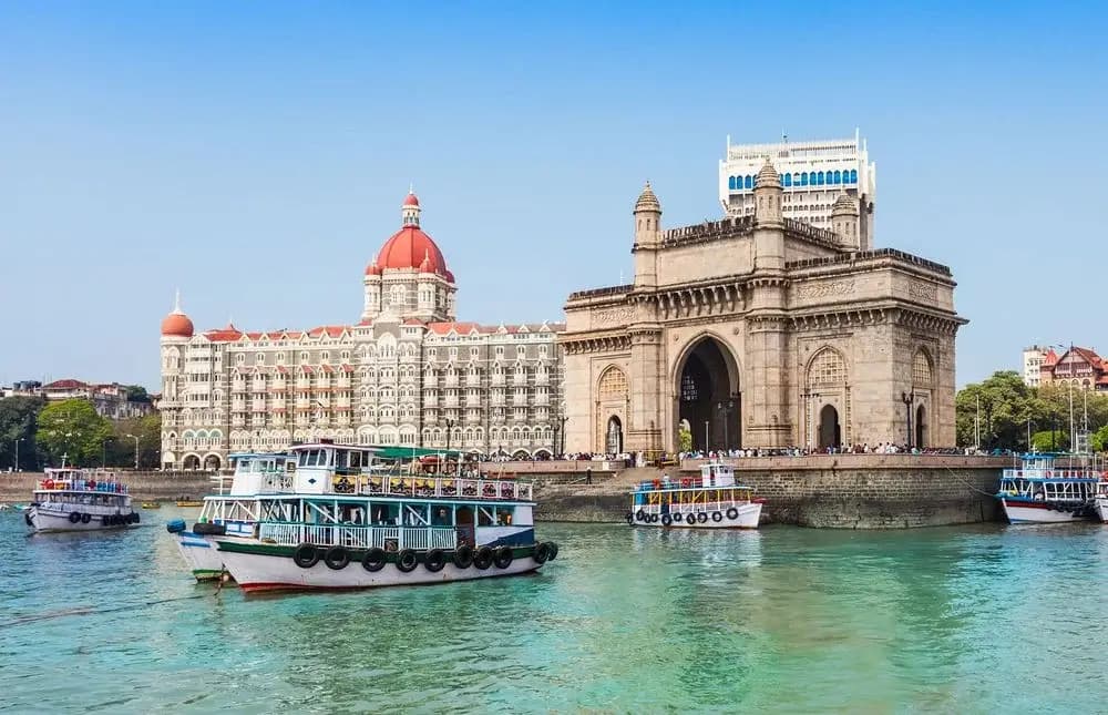 Mumbai sightseeing during Ayurveda wellness tour in India featuring Elephanta Caves and local culture