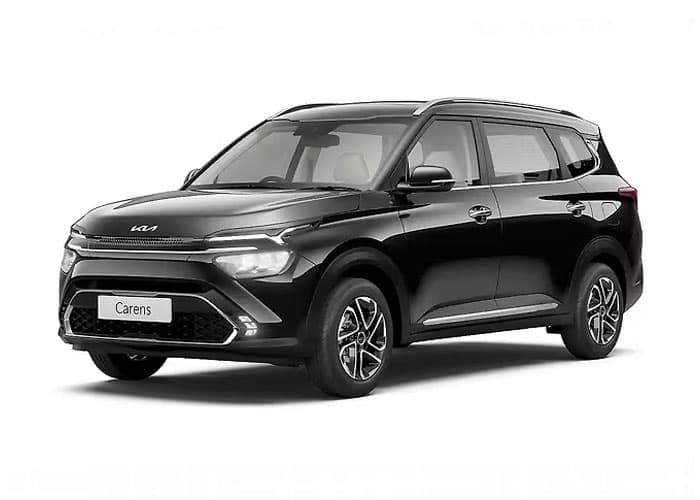 Kia Carens family and group travel vehicle with chauffeur service in India
