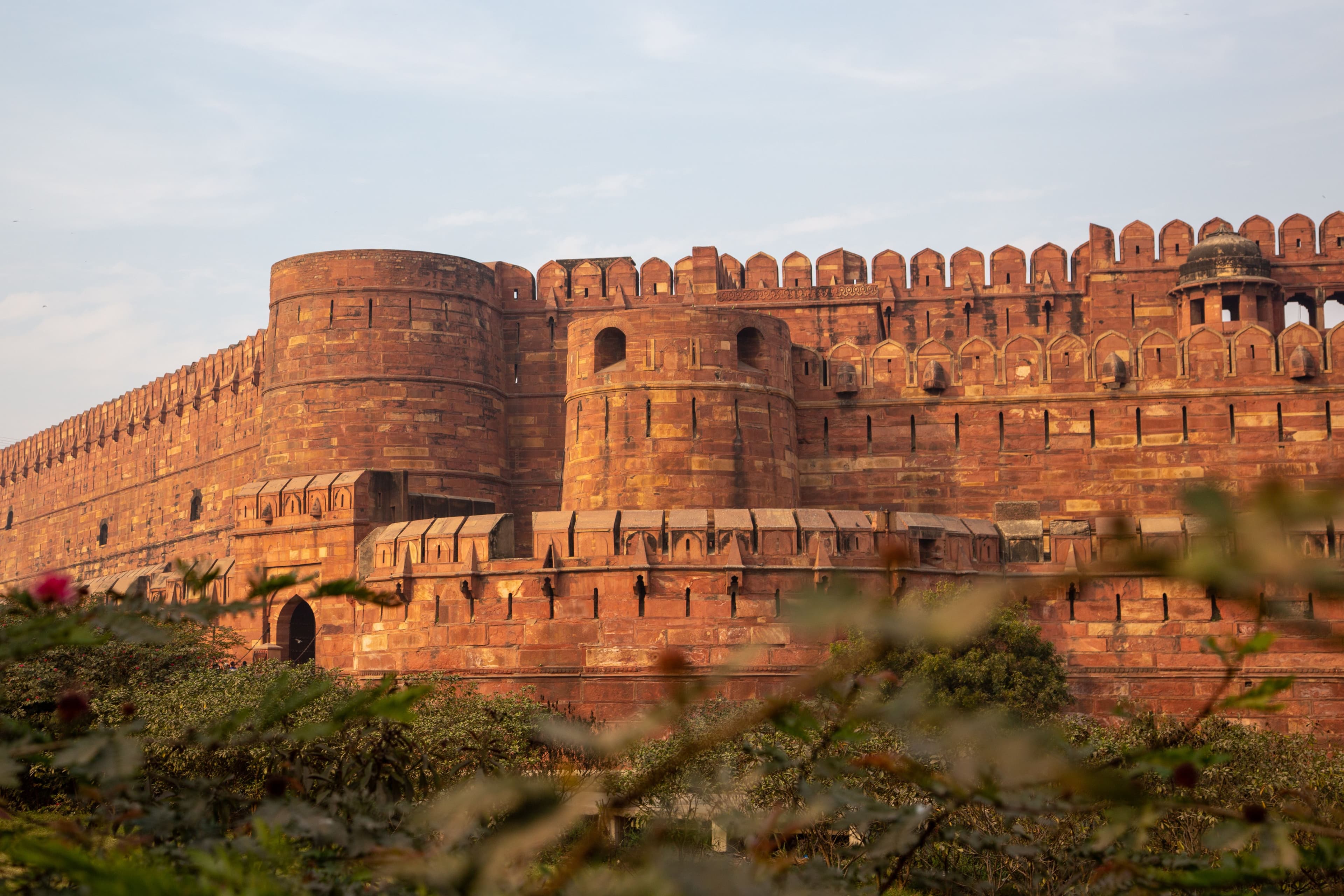 Agra Fort's red sandstone ramparts overlooking the Yamuna River